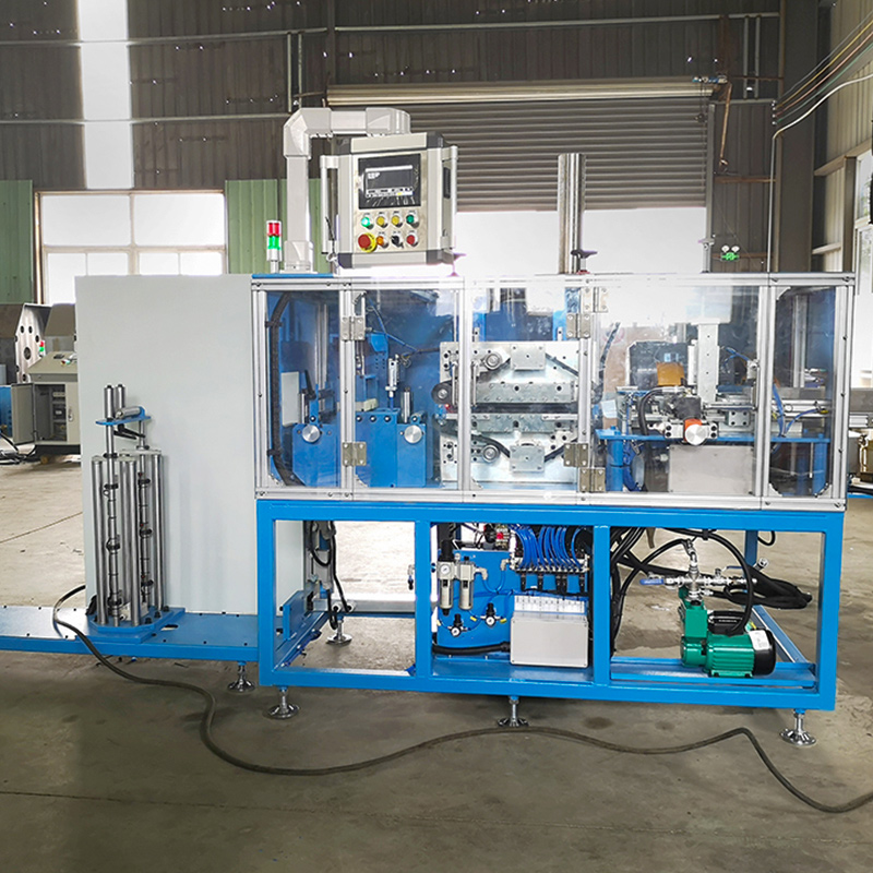Industrial hose cutting and skiving machine setup in a production facility